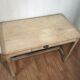 Antique farmhouse table in raw wood