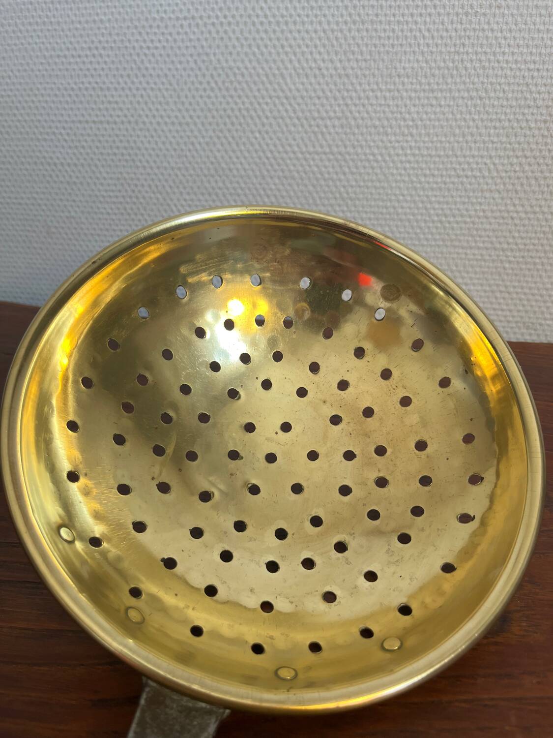 Large skimmer in brass and wrought iron, early 20th century