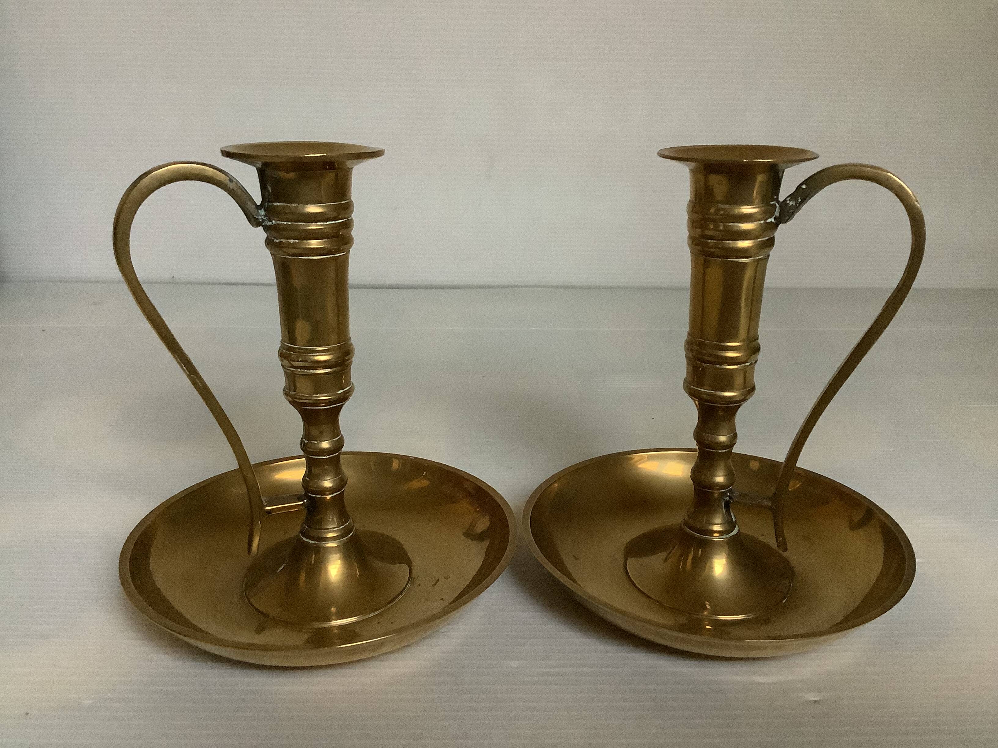 Pair of brass cellar rat candlesticks