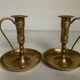 Pair of brass cellar rat candlesticks