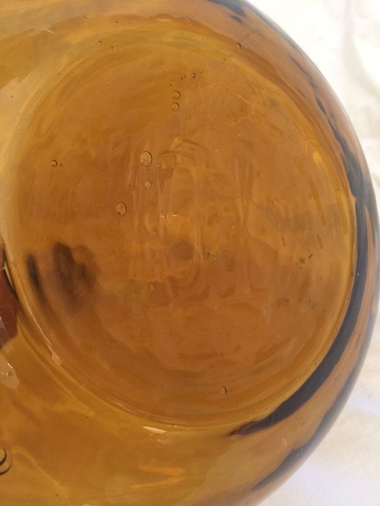 Transparent amber demijohn of 10L