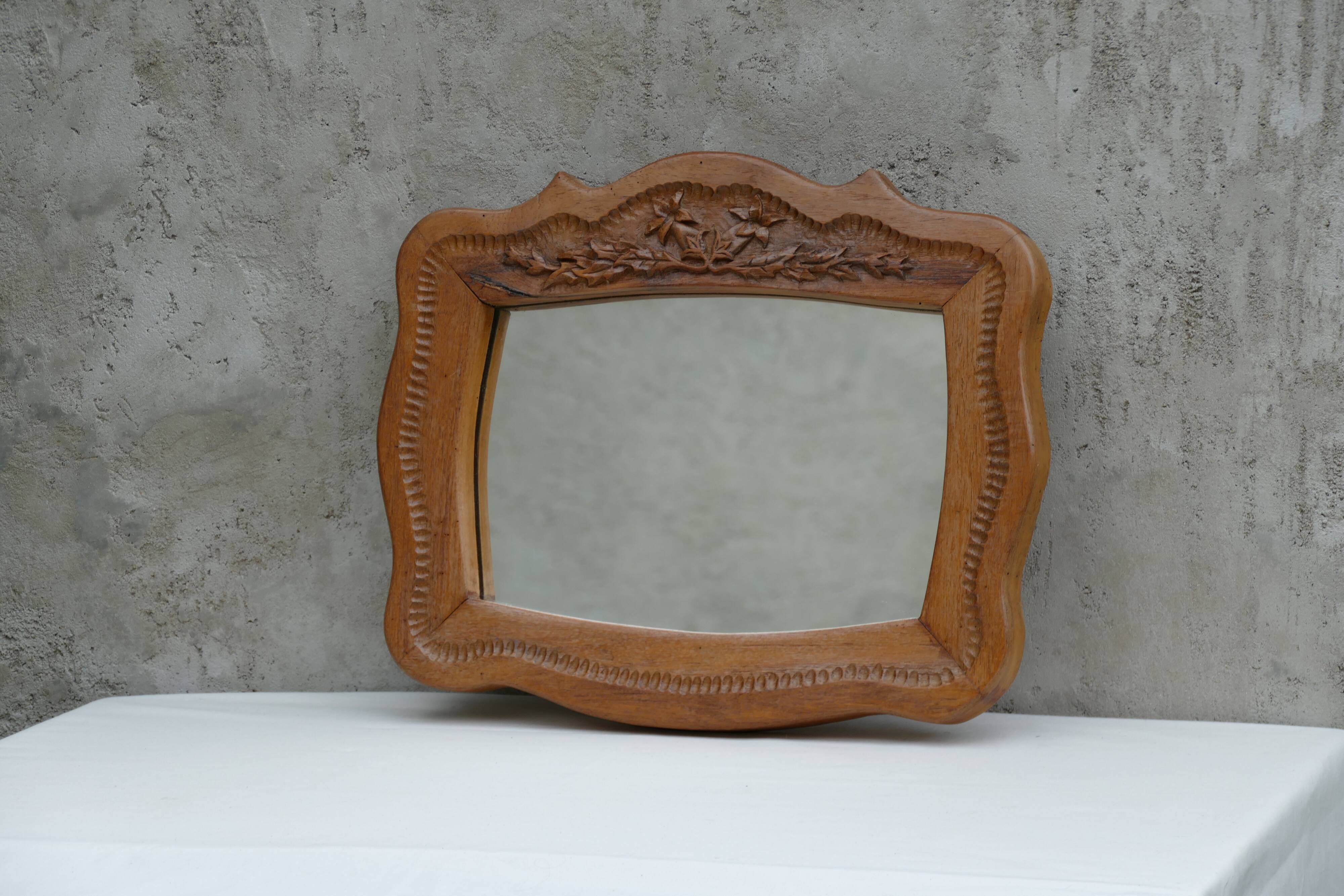 Hand-carved wooden mirror