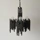 Three-armed suspended lamp in wrought iron, brutalist design, 1960s, Italy.