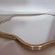 Free-form asymmetric mirror