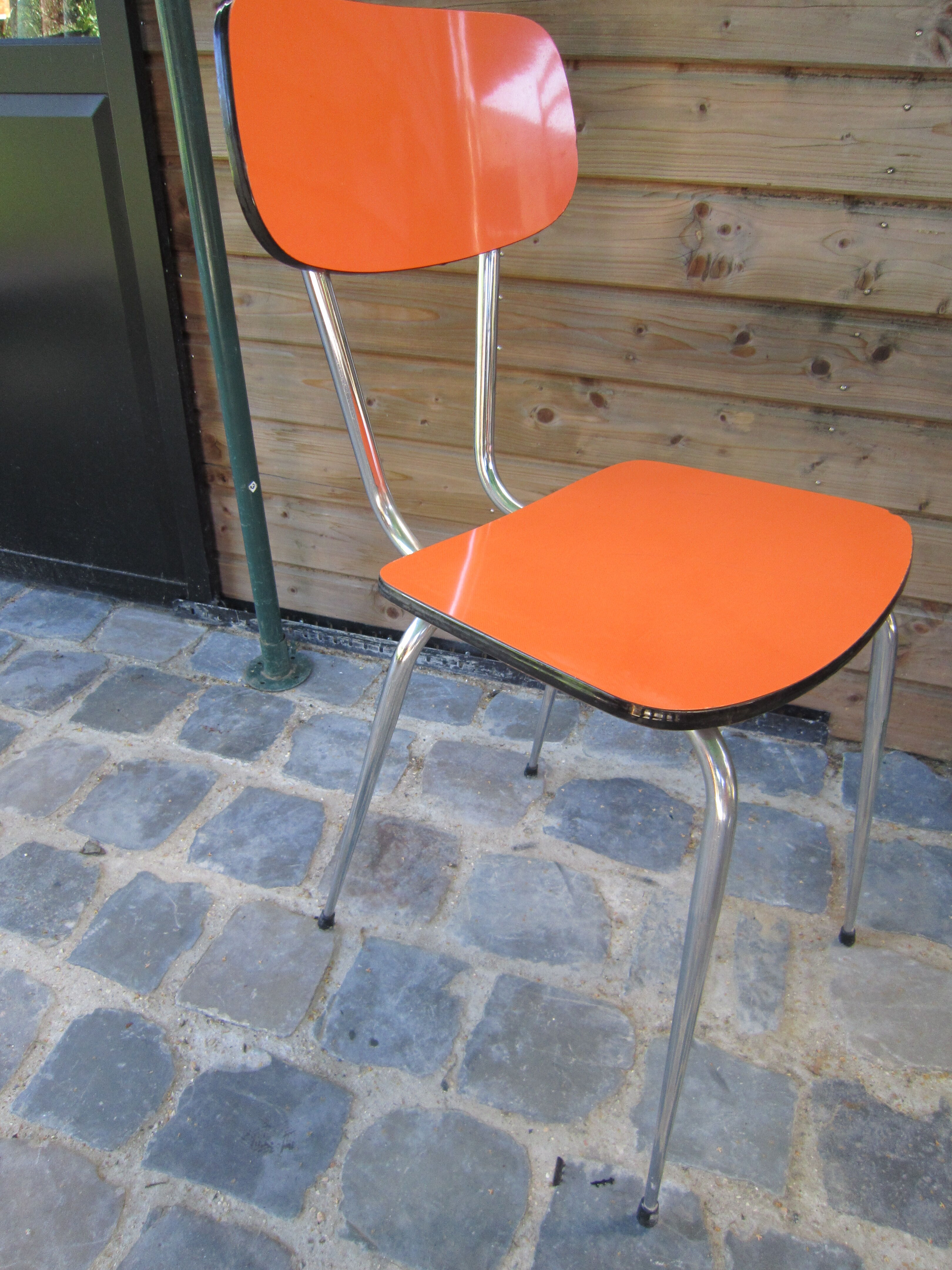 4 orange formica chairs