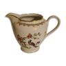 Royal porcelain milk jug with floral and peacock decoration