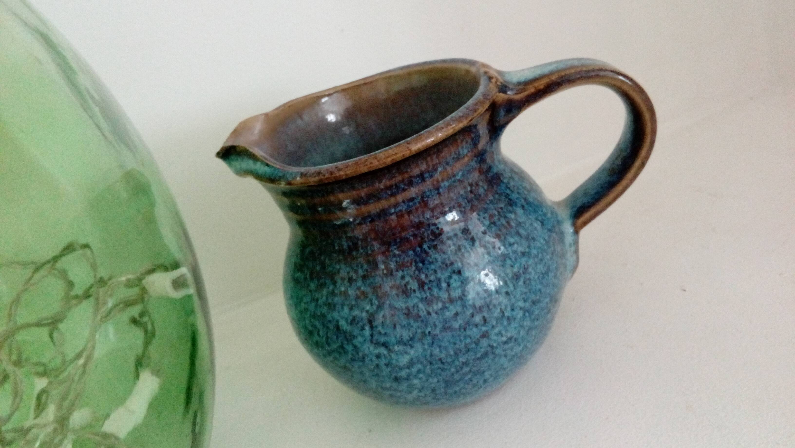 Pitcher in enamelled blue sandstone