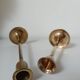 Set of two straight brass candlesticks.