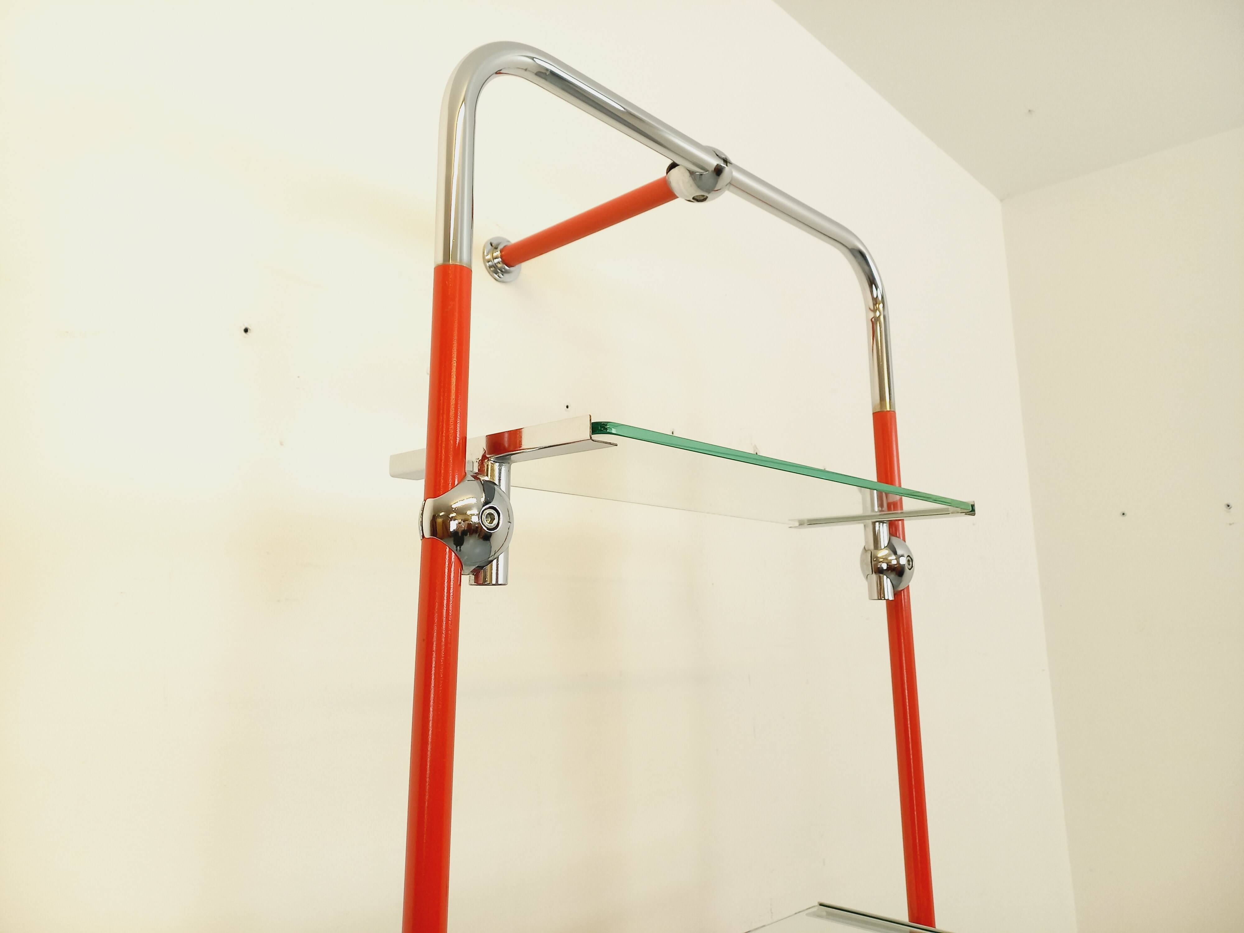 Modular bookshelf in vintage Bauhaus style, red metal, chrome.