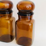 Pair of vintage amber glass jars