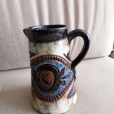 Glazed pottery pitcher