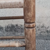 Vintage handmade wooden stool and rope