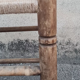 Vintage handmade wooden stool and rope