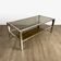 Chrome and smoked glass coffee table with double top from the 1970s.