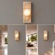 Wall light in travertine