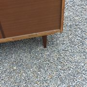 Vintage walnut varnished chest of drawers with 4 drawers from the 1960s.