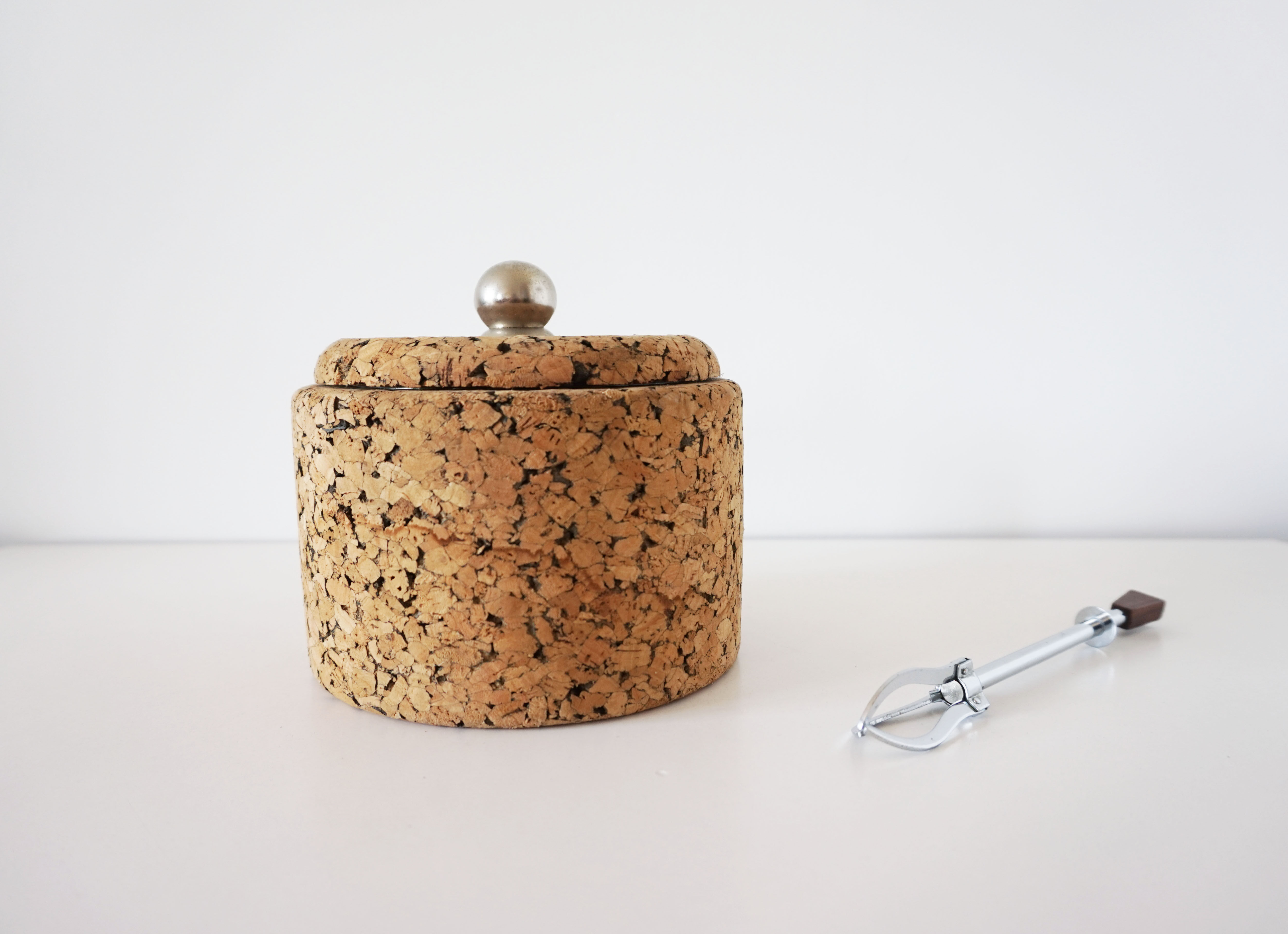 Cork ice bucket and its 1970 ice clip