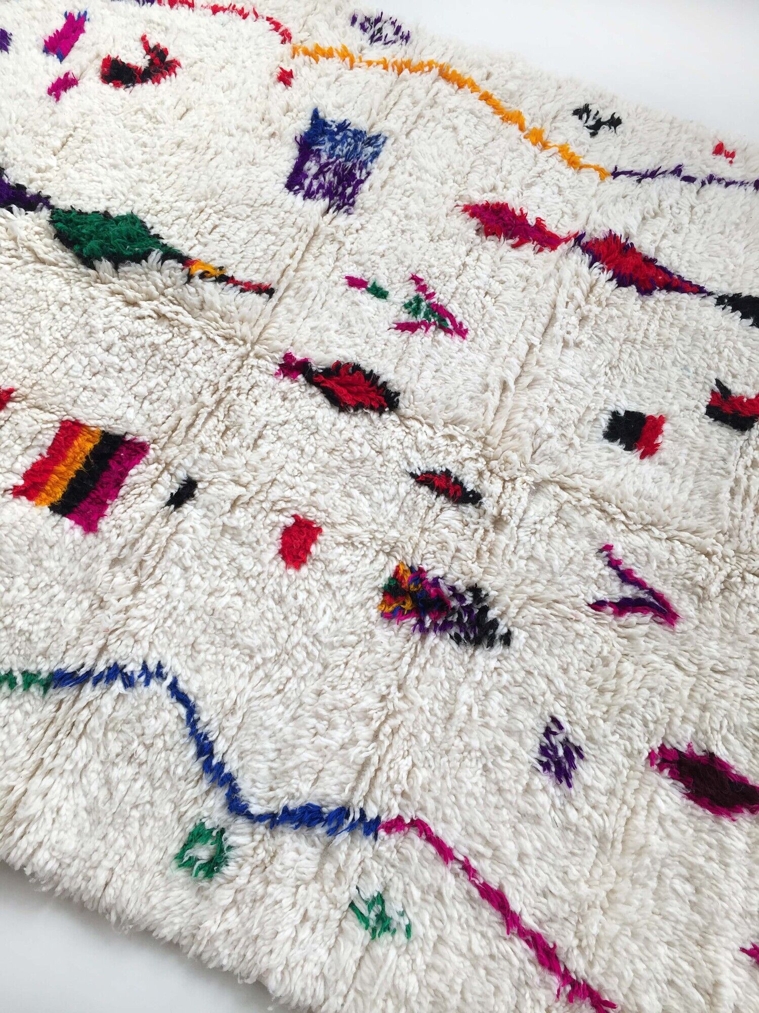 Moroccan Berber carpet Azilal unbleached with colored patterns 242x159cm