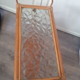 vintage rattan magazine rack with glass top, missing a rim of the magazine rack