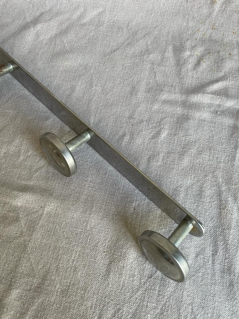 Metal wall coat rack