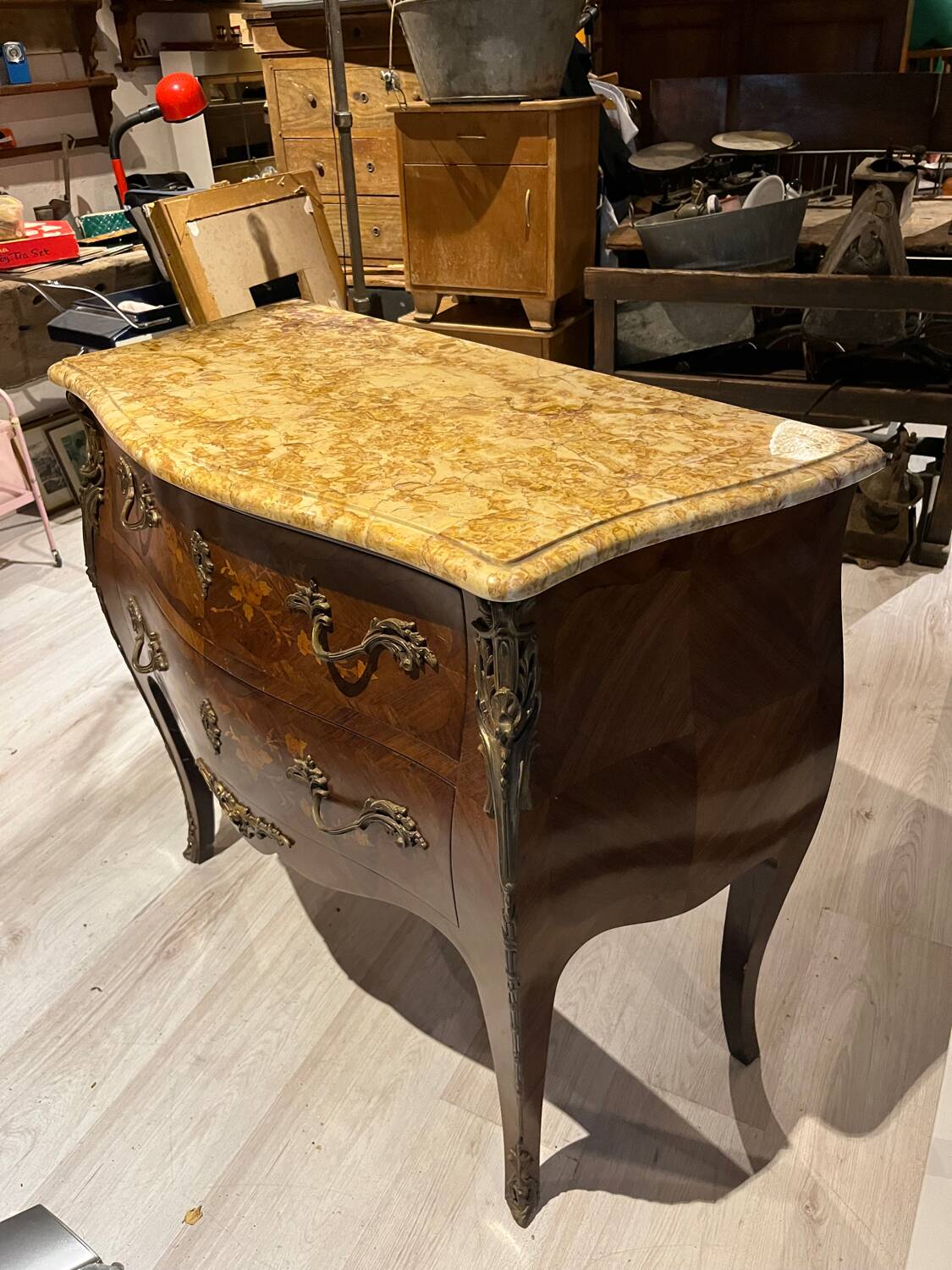 Curved chest of drawers with marquetry and marble