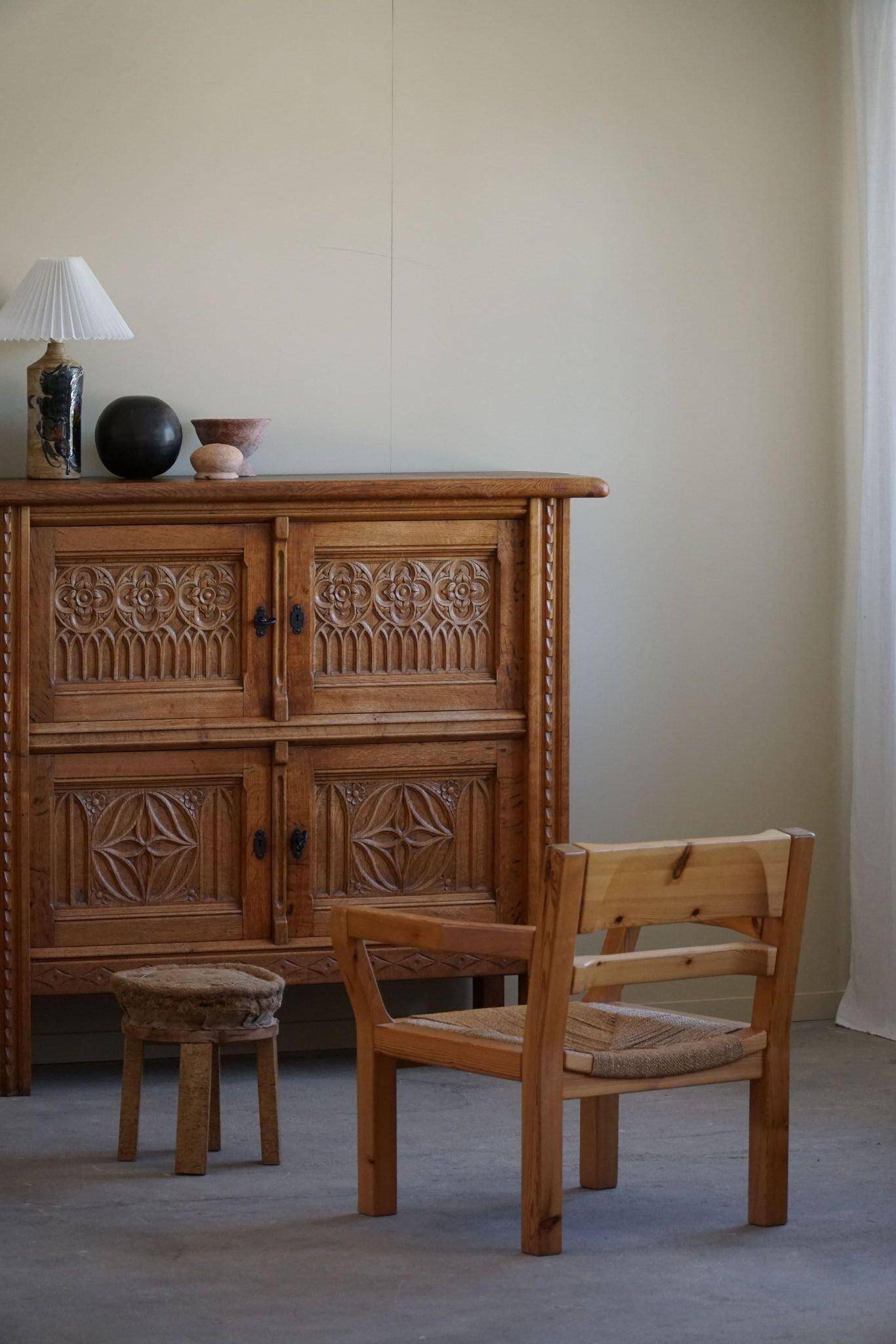 Tage Poulsen, a pair of brutalist chairs in pine and cord, Danish modern style, 1970s.