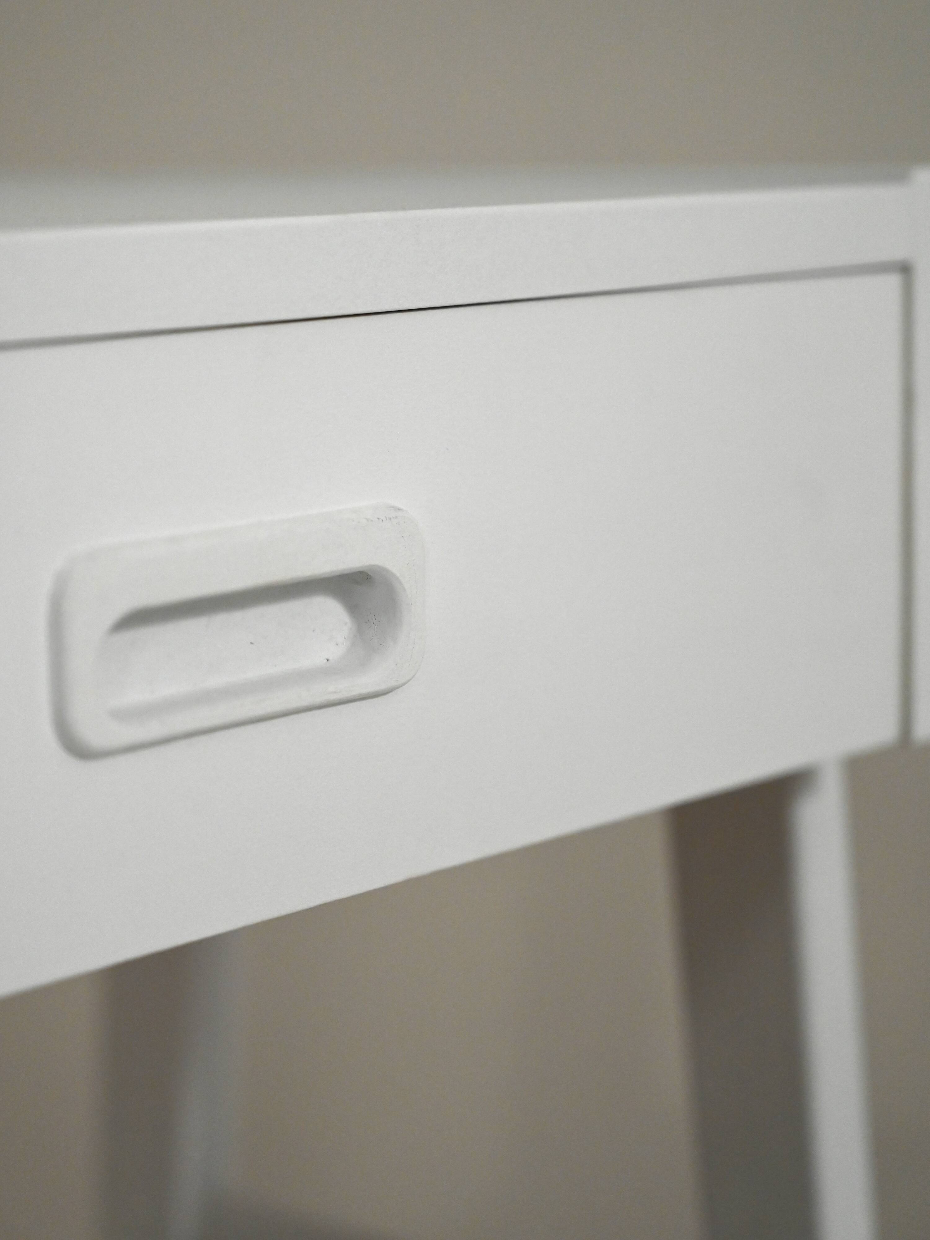 Scandinavian bedside table painted in white