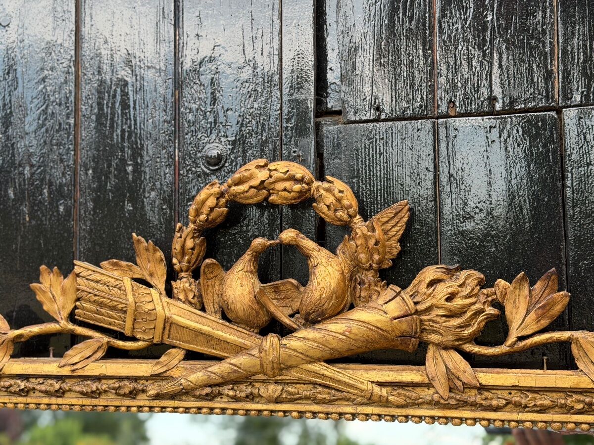 Louis XVI mirror in carved and gilded wood, 18th century