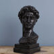 David head in black waxed bean