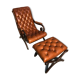 Chair padded and are resting foot.
