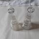 Set of two oil and vinegar glass cruets.