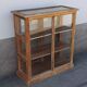 Antique wooden display cabinet with 2 doors