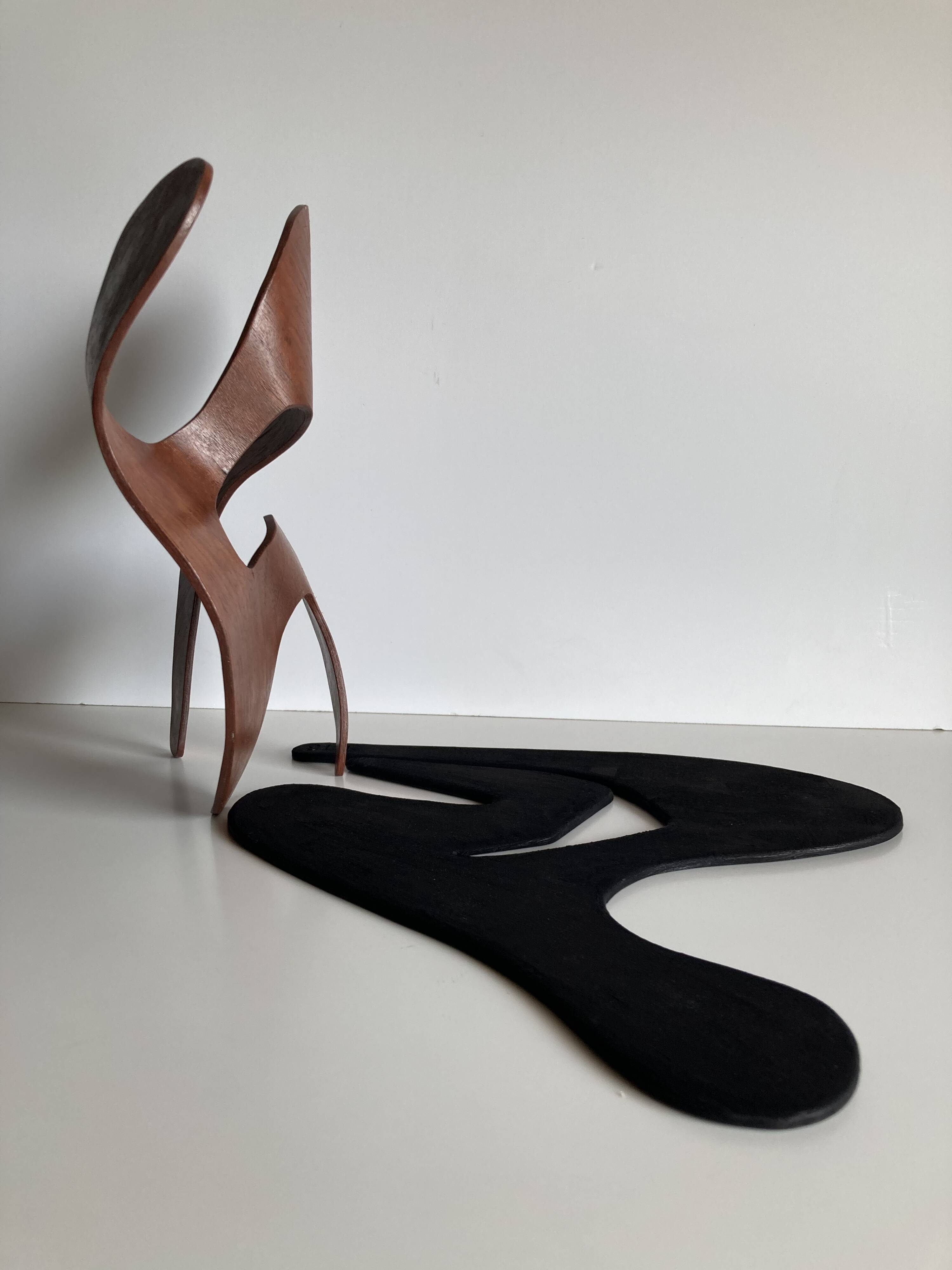 Mrs. Charles Eames_ The shadow does not bend, walnut plywood sculpture