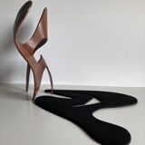 Mrs. Charles Eames_ The shadow does not bend, walnut plywood sculpture