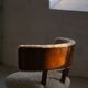 A modern Danish elegant low-back chair, reupholstered in lambswool, 1940s.