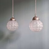 Art Deco trio of frosted glass pendants, 1920s-30s.