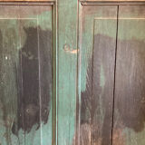 Old glazed wooden door patinated