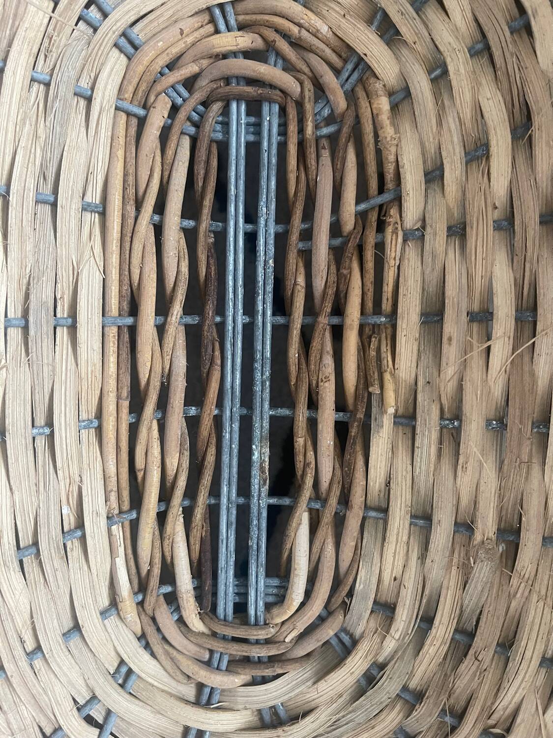 Old rattan and metal basket