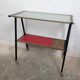Vintage 1950s rolling dessert trolley with two shelves.