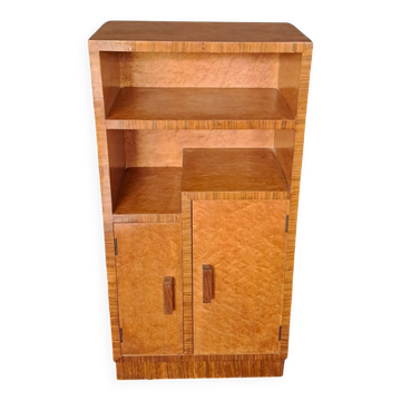Art Deco cabinet in speckled maple veneer with asymmetrical shelves.