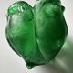 Green glass paste emptying cup from the Art Deco period