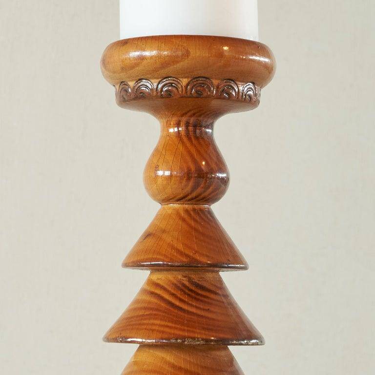Pair of Scandinavian lacquered wooden candle holders