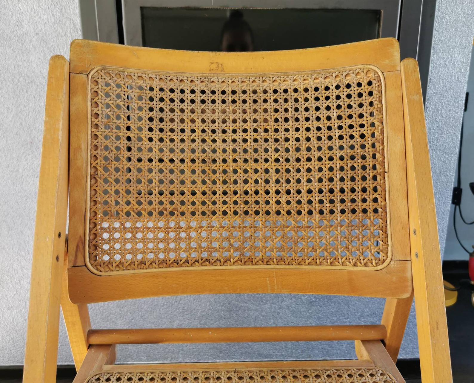 Vintage wooden folding chair with 1970 rattan seat and back