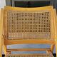 Vintage wooden folding chair with 1970 rattan seat and back