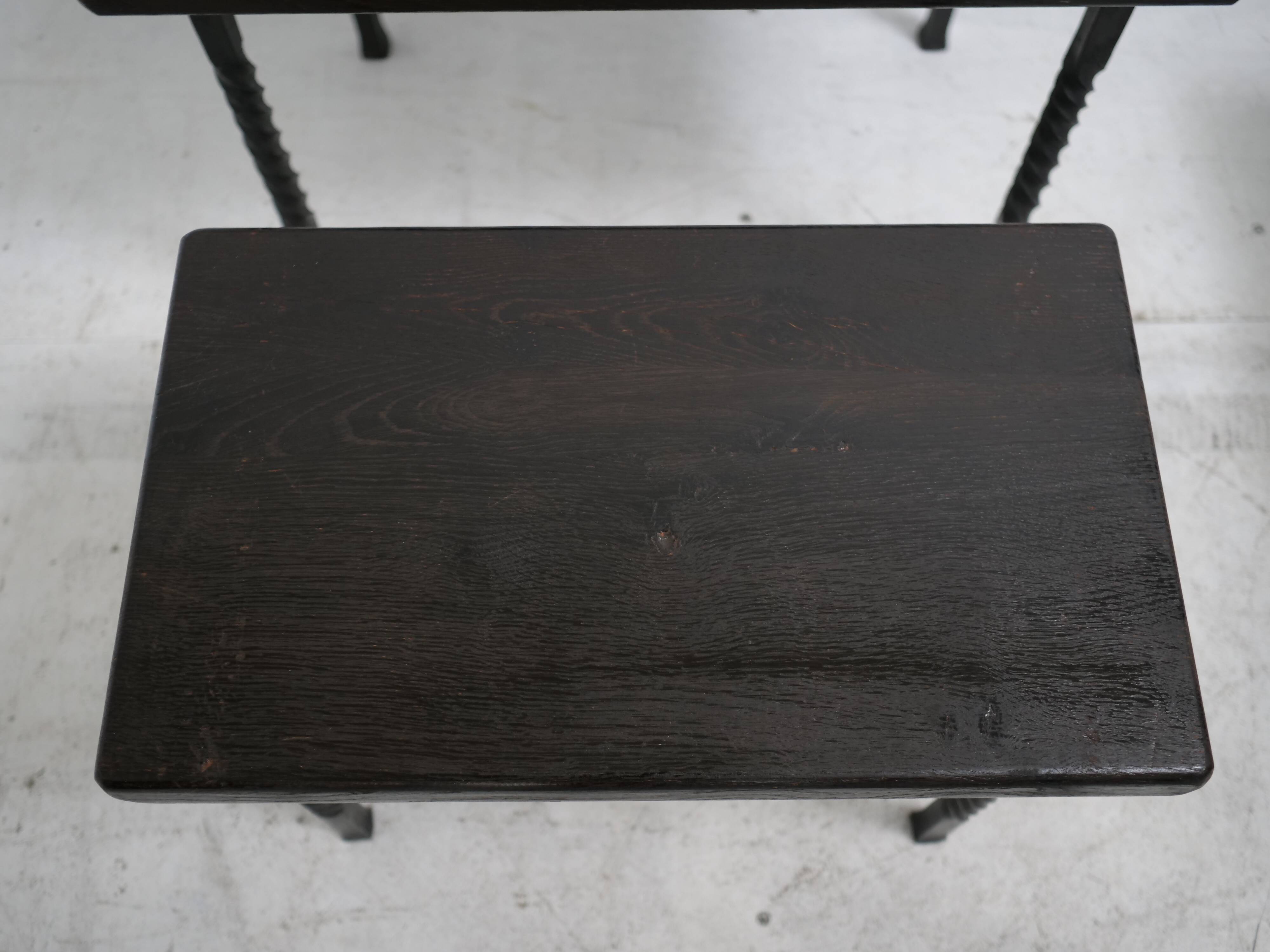 Brutalist nesting table in ebonized oak and wrought iron