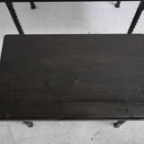 Brutalist nesting table in ebonized oak and wrought iron