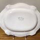 Moustier earthenware dish, white and blue