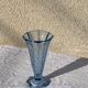 Blue molded glass vase in art deco relief