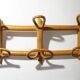 Wall coat rack in rattan and woven wicker, 1960s.