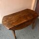 Round wooden folding table
